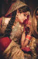 Front Twisted Side Braids Embellished With Delicate Pearl Strings by Gautam Khullar Wedding-photography Wedding-hairstyles | Weddings Photos & Ideas