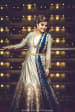 Exquisite Silver Indo-Western Gown With Detailed Golden Print On Borders And Sleek Golden Waist Best Completing Look With Blue Dupatta With Golden Borders by Gautam Khullar Wedding-photography Wedding-dresses | Weddings Photos & Ideas