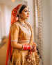 Bride In A Yellow Lehenga And Orange Dupatta Before Her Wedding by Gautam Khullar Wedding-photography Wedding-dresses | Weddings Photos & Ideas