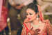 Gorgeous Bride With Dark Golden And Black Shimmery Eye Makeup And Red Lips by Akshat Mongia Bridal-makeup Bridal-jewellery-and-accessories | Weddings Photos & Ideas