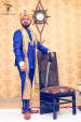 Groom With Royal Blue Suit And Golden Turban WIth Kilangi Brooch by First Frame Studio Groom-wear-and-accessories | Weddings Photos & Ideas