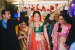A traditional Red Lehenga With green Blouse And Orange Dupatta by Navdeep Soni Wedding-photography Wedding-dresses | Weddings Photos & Ideas