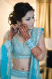 Shining Blue Bridal Lehenga With Messy Bun Goes Well For Engagement Day by Navdeep Soni Wedding-photography Wedding-hairstyles Wedding-dresses | Weddings Photos & Ideas
