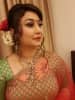 The quintessential rose and gajra in her hair