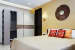 Wooden Sun Shaped Mirror And Shifting Wardrobe by Mridul Jain Bedroom Minimalistic | Interior Design Photos & Ideas