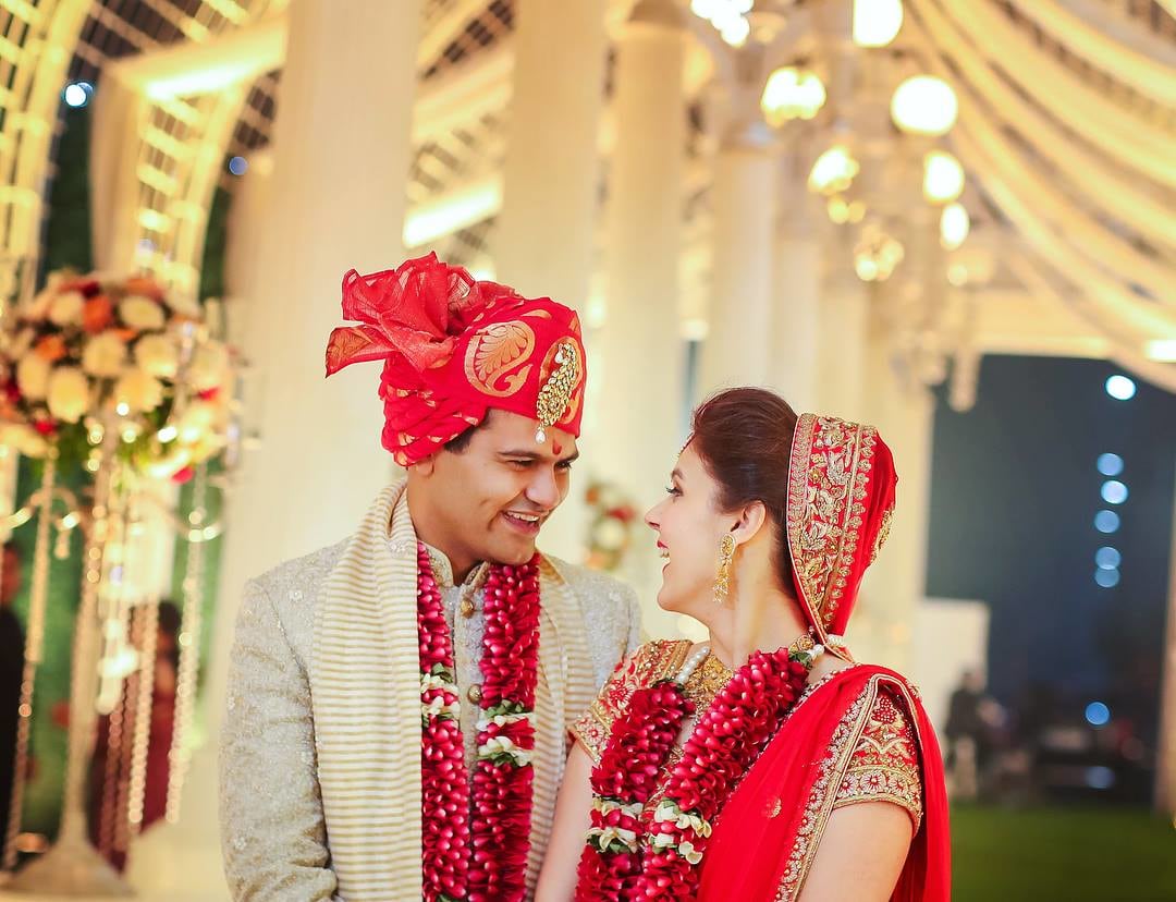 Red And Gold Silk Turban With Gold Kilangi Brooch by Kabeer Grover Wedding-photography Groom-wear-and-accessories | Weddings Photos & Ideas