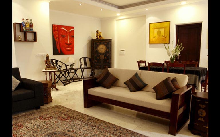Living Room With Wooden Beige Sofa And Traditional Carpet by Vimi Rath Living-room Modern | Interior Design Photos & Ideas
