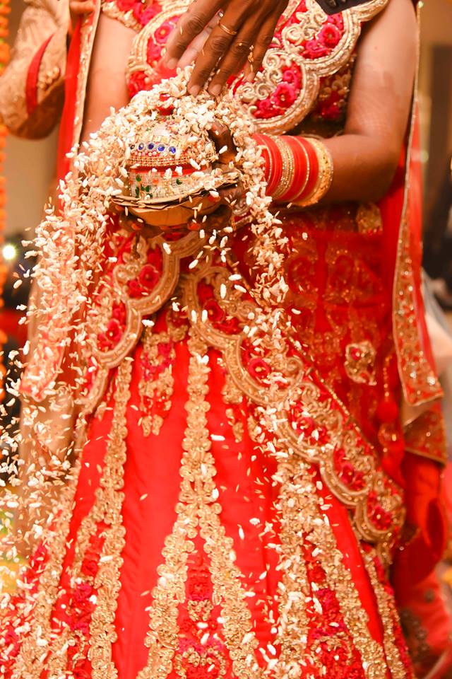 Red Lehenga Lavished With Gold Work! by Saurabh Wedding-photography | Weddings Photos & Ideas