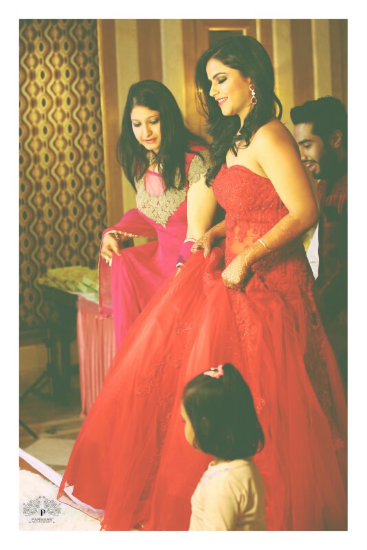 Bride-To-Be Wearing A Stunning Red Gown by Rajan Parmar Wedding-photography Wedding-dresses | Weddings Photos & Ideas
