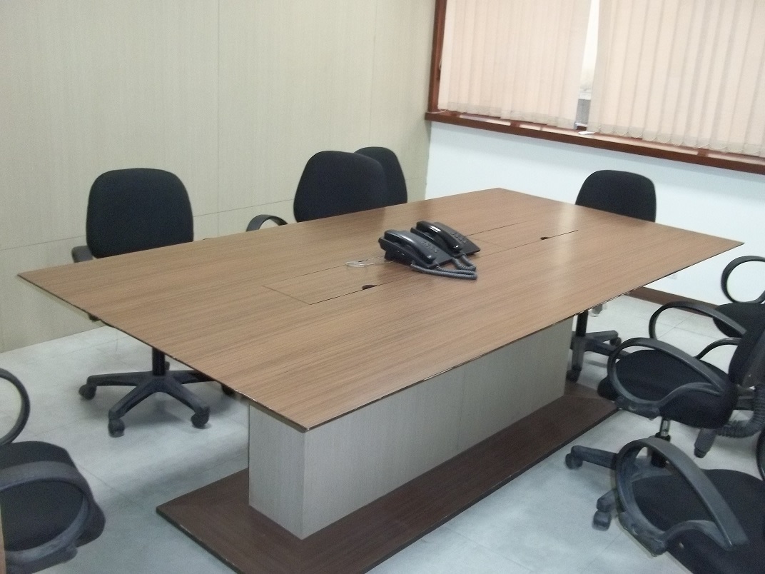 Meeting Room With Simple Furnished Table And Chair by Abhinav Jain | Interior Design Photos & Ideas
