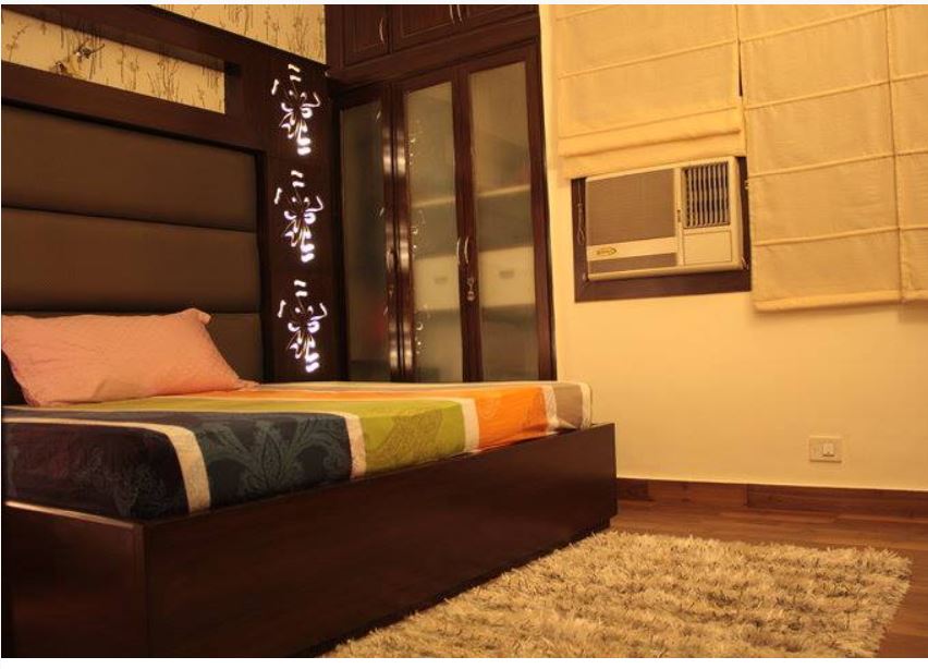 Modern Bedroom with Wood Flooring and a Rug by Chetan Chanana Bedroom Modern | Interior Design Photos & Ideas