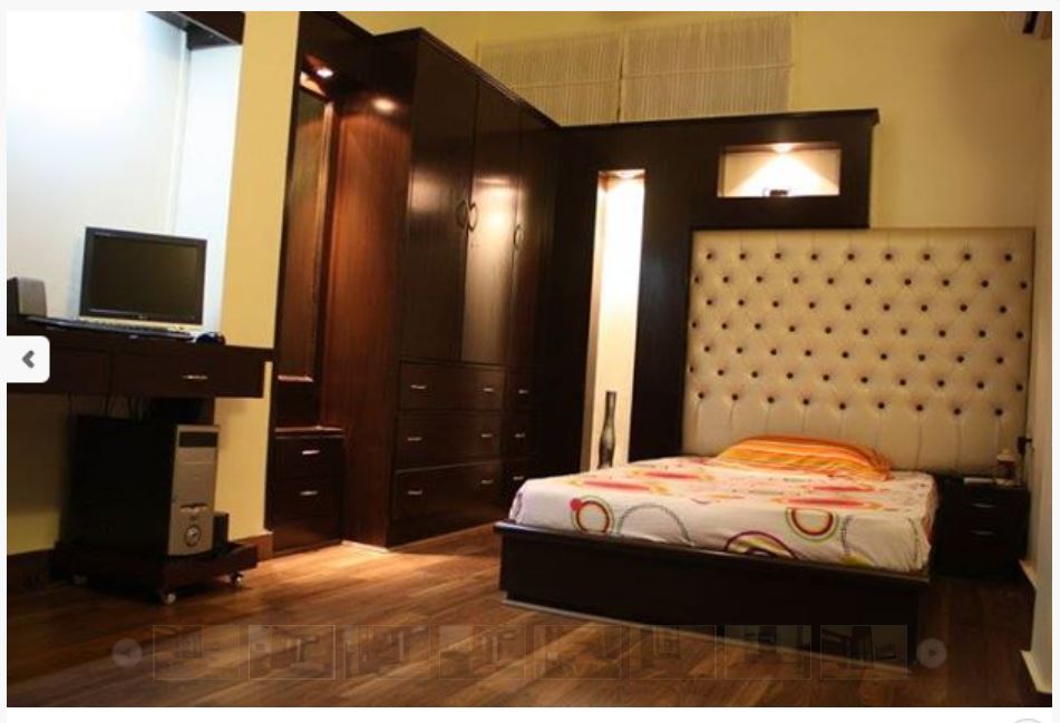 A Master bedroom with wooden cupboard and a Study Table by Chanana Enterprises Bedroom | Interior Design Photos & Ideas