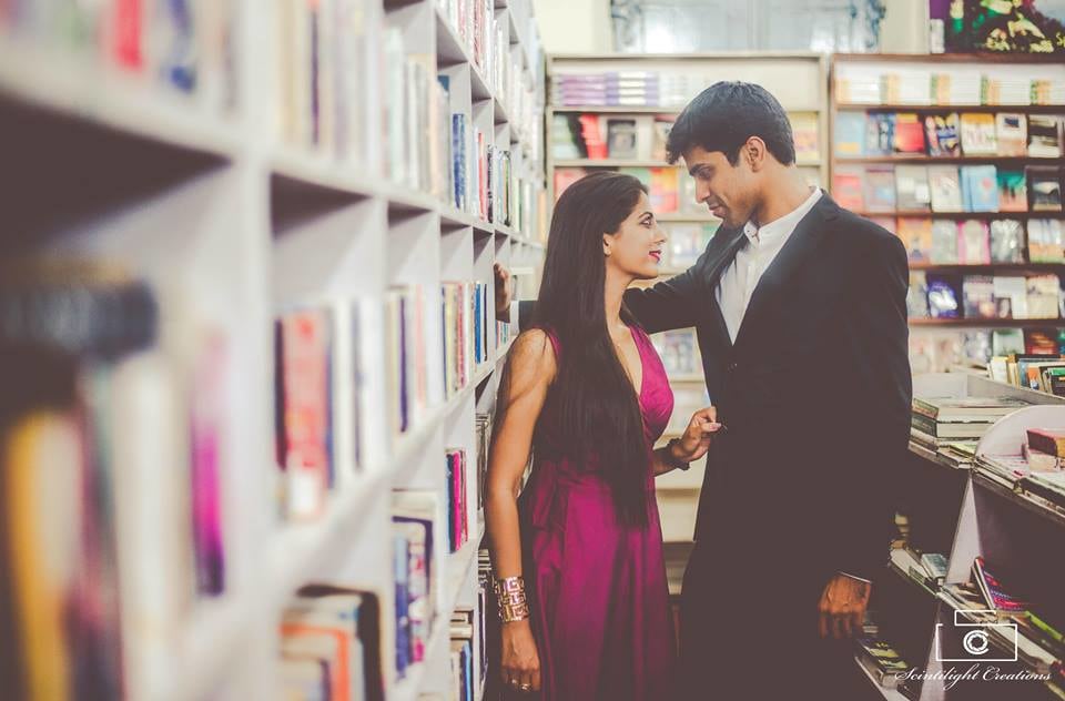 Bride and Groom-To-Be Posing Amongst The Books by Gracian Wedding-photography | Weddings Photos & Ideas