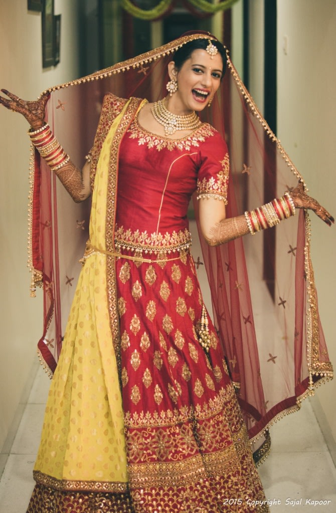 Happy Bride Wearing a Crimson Red Lehenga With Zardozi Work by Sajal Kapoor Wedding-photography Wedding-dresses | Weddings Photos & Ideas
