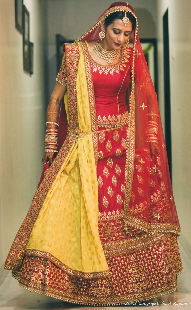 Bride Wearing a Crimson Red Lehenga With Zardozi Work by Sajal Kapoor Wedding-photography Wedding-dresses | Weddings Photos & Ideas