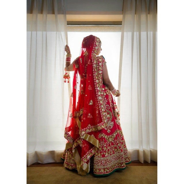 Bride Wearing Crimson Red Lehenga With Zardozi Work by Conscious Cinematic Arts Wedding-photography Wedding-dresses | Weddings Photos & Ideas