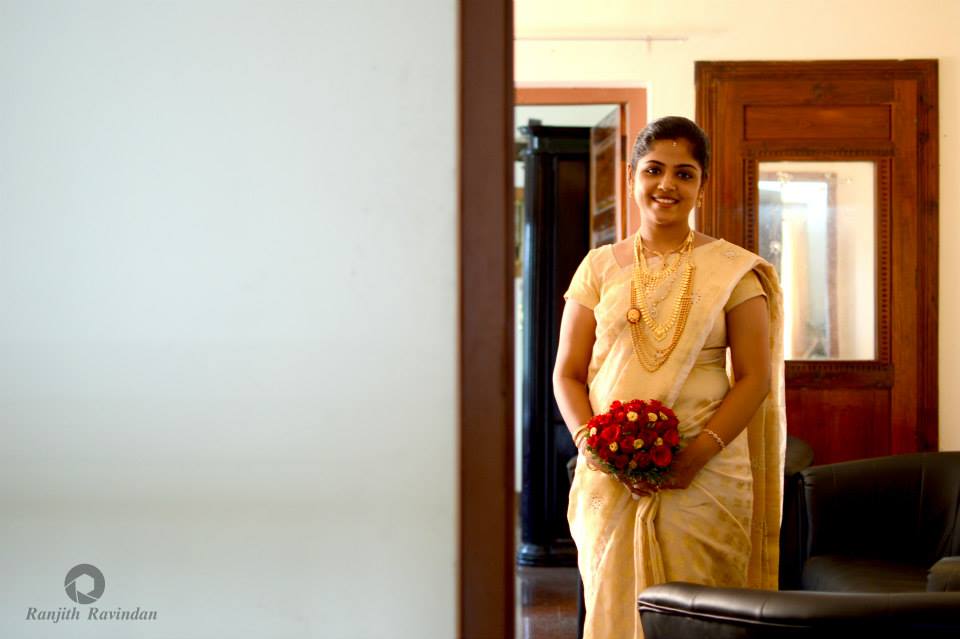Elegant Christian Bride Holding Red Bouquet by Ranjith R Ravindran Wedding-photography | Weddings Photos & Ideas