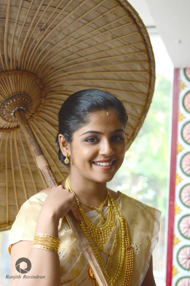 Christian Bride Posing With Umbrella by Ranjith R Ravindran Wedding-photography | Weddings Photos & Ideas