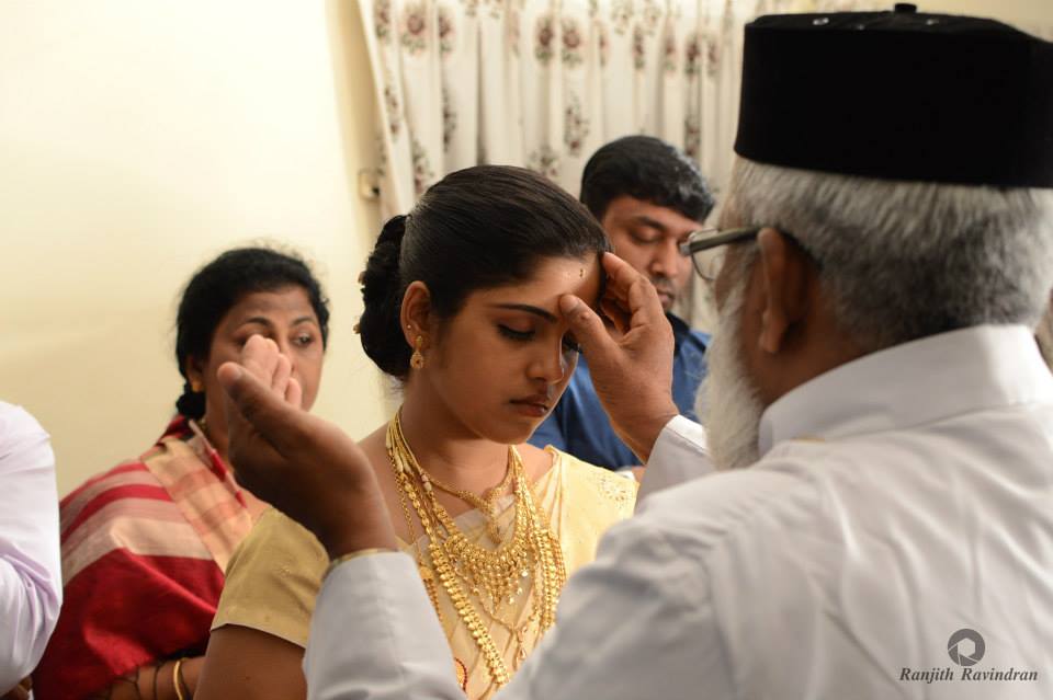 Bride Receiving Blessings From Pastor During Her Wedding by Ranjith R Ravindran Wedding-photography | Weddings Photos & Ideas