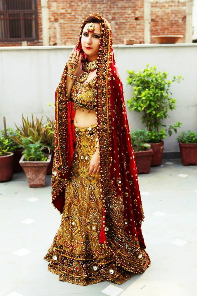 Bride Wearing Maroon and Yellow Heavy Mirror Work Lehenga by Nitin Tanwar Wedding-dresses | Weddings Photos & Ideas