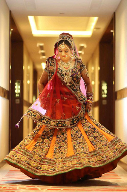 Elegant Bride Wearing Emerald Green and Yellow Applique Work Lehenga by Kshitij Gupta Wedding-dresses | Weddings Photos & Ideas