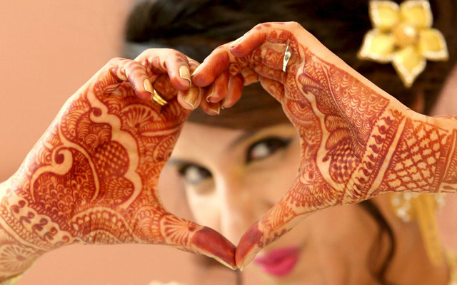 Bride Doing The Heart Pose During Her Engagement by Kshitij Gupta Wedding-photography | Weddings Photos & Ideas