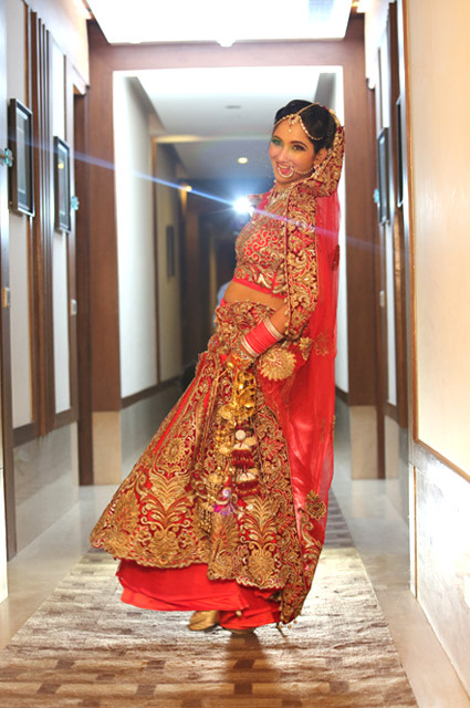 Bride Looking Regal in Crimson Red Lehenga With Heavy Golden Embroidery by Kshitij Gupta Wedding-dresses | Weddings Photos & Ideas
