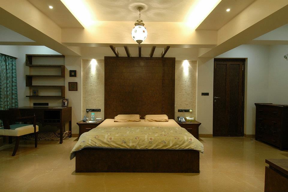 Beige and Brown Bedroom With False ceiling And Wooden Wall Art by Hoshedaar Eruch Carnac Bedroom Contemporary | Interior Design Photos & Ideas