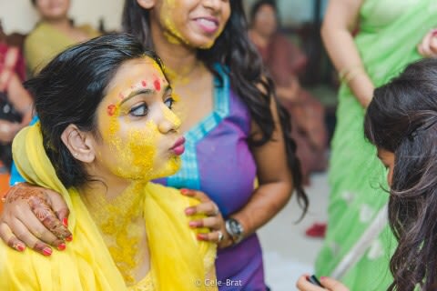 Fun mood of bride during haldi ceremony by Cele-brat Wedding-photography | Weddings Photos & Ideas
