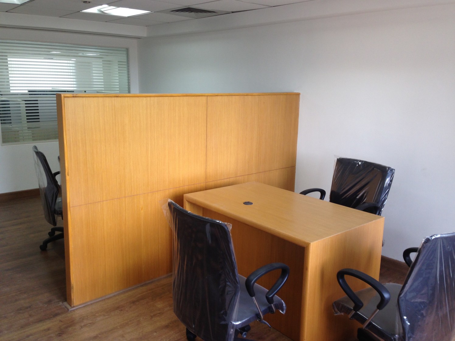 Cellular Office With Black Leather Back Chairs by Imran Ahmed Baig Contemporary | Interior Design Photos & Ideas