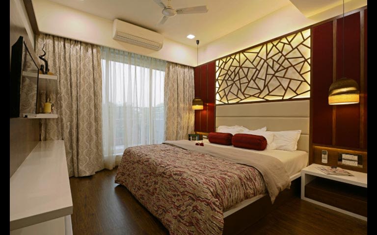 A wine colored bedroom! by Artistic design group Bedroom | Interior Design Photos & Ideas