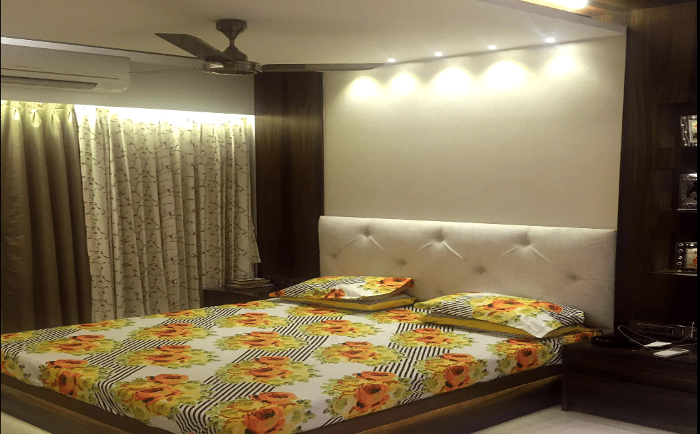 Bedroom With Low Levelled Bed And Wooden Dressing Table by Deepak Sharma Bedroom Contemporary | Interior Design Photos & Ideas