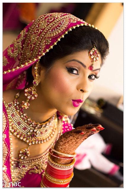 Bride Adoring Beautiful Bridal Makeup by Neha Arora Wedding-photography Bridal-jewellery-and-accessories Bridal-makeup | Weddings Photos & Ideas