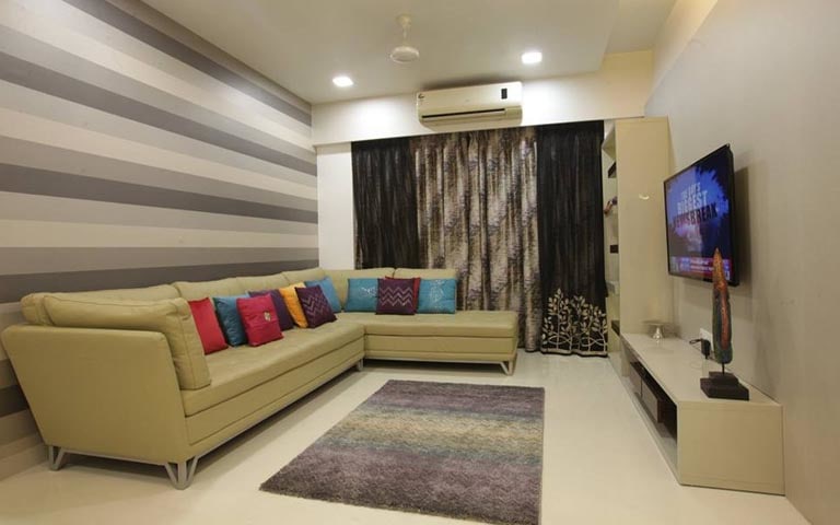 Living Room With Sectional Sofa And Striped wallpaper by Swagita Living-room Contemporary | Interior Design Photos & Ideas
