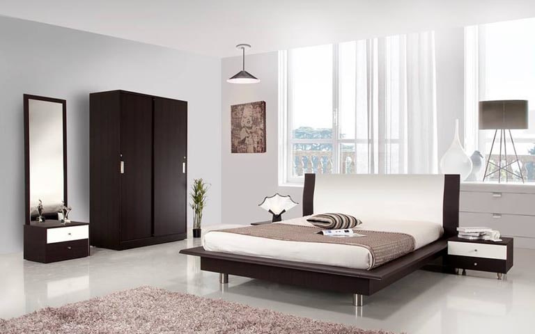 Bedroom With Dark Oakwood Furniture And Rough Fibre Rug by Swagita Bedroom Modern | Interior Design Photos & Ideas