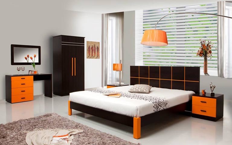 Elegant Bedroom With Dark Wood Furniture And Rough Fibre Rug by Swagita Bedroom Contemporary | Interior Design Photos & Ideas