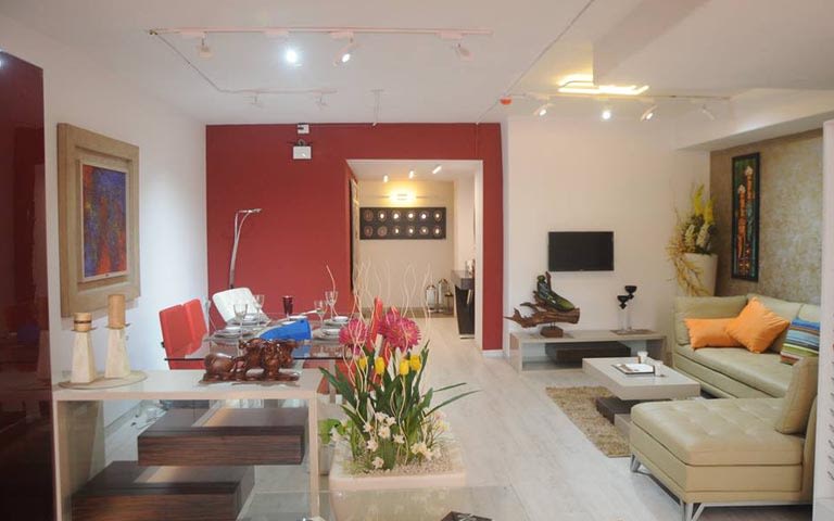 Living Room With Sectional Sofa And Flowery Decor by Swagita Living-room Contemporary | Interior Design Photos & Ideas