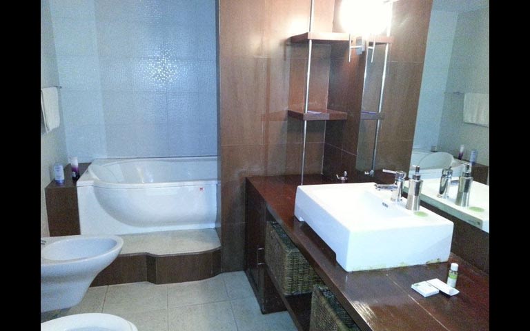 Wood finish modern bathroom decor by The Design Ministry Bathroom | Interior Design Photos & Ideas