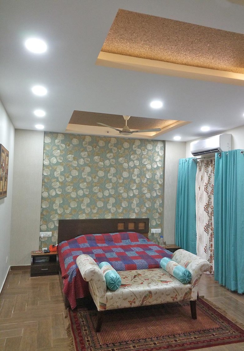 Master Bedroom with Patterned Wall and Queen Size bed by Ar. Barkha Jain