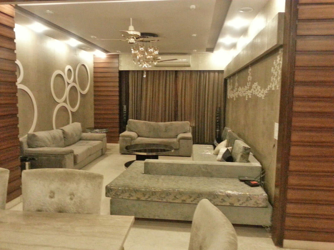 Cement Grey Sofa Set with Wall Art and Chandelier by Ar. Barkha Jain Living-room Modern | Interior Design Photos & Ideas