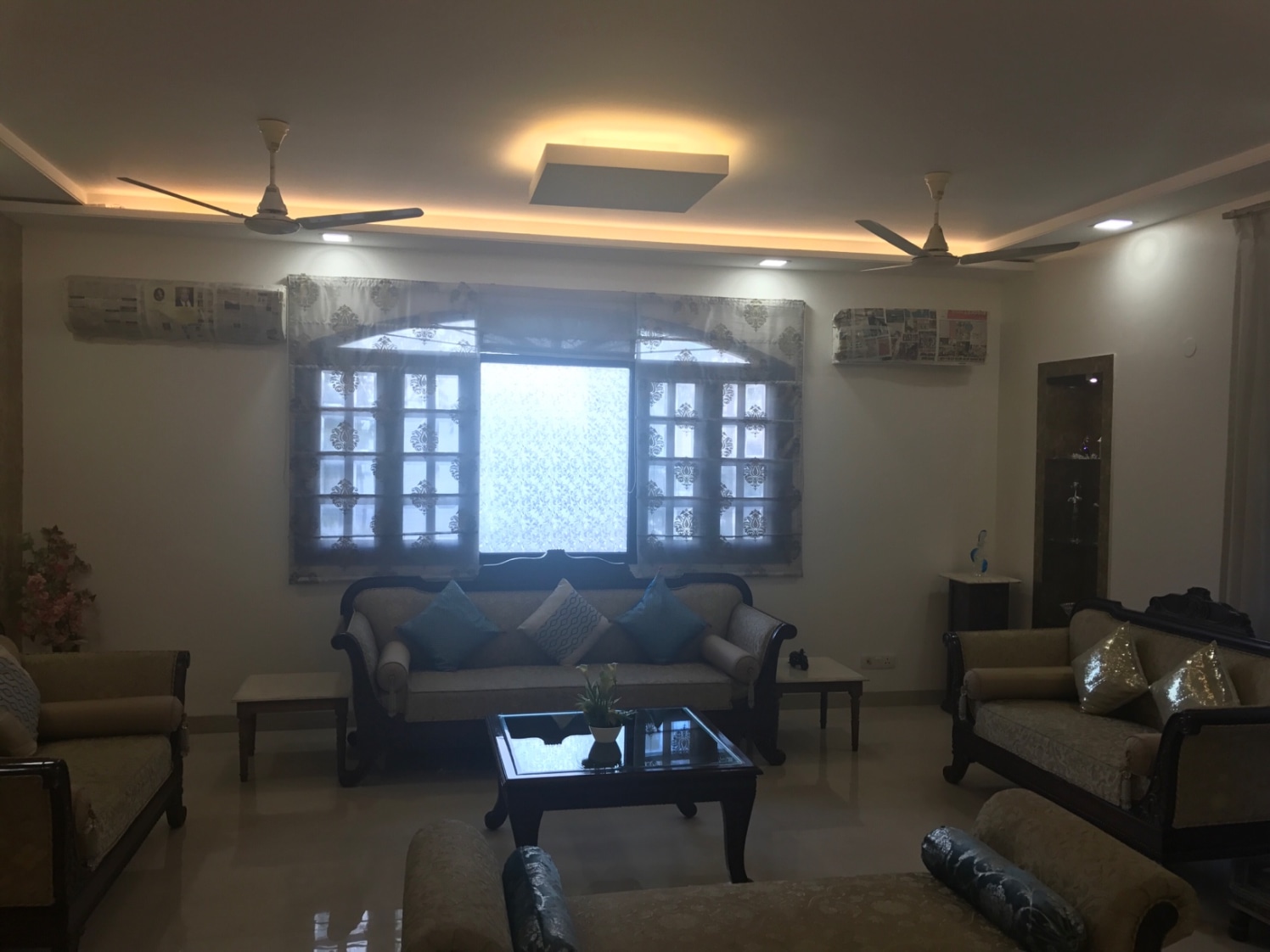 Living Space with Traditional Sofa Set and Glass Top Centre Table by Ar. Barkha Jain Living-room Modern | Interior Design Photos & Ideas