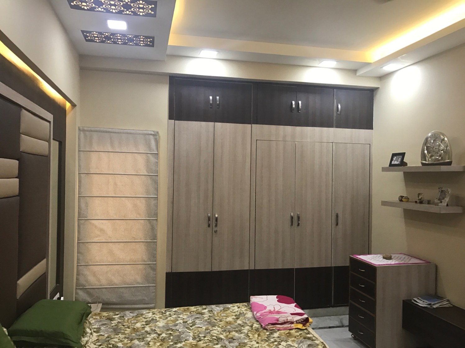 Sophisticated bedroom Space with Wooden Wardrobe and False Ceiling by Ar. Barkha Jain Bedroom Modern | Interior Design Photos & Ideas