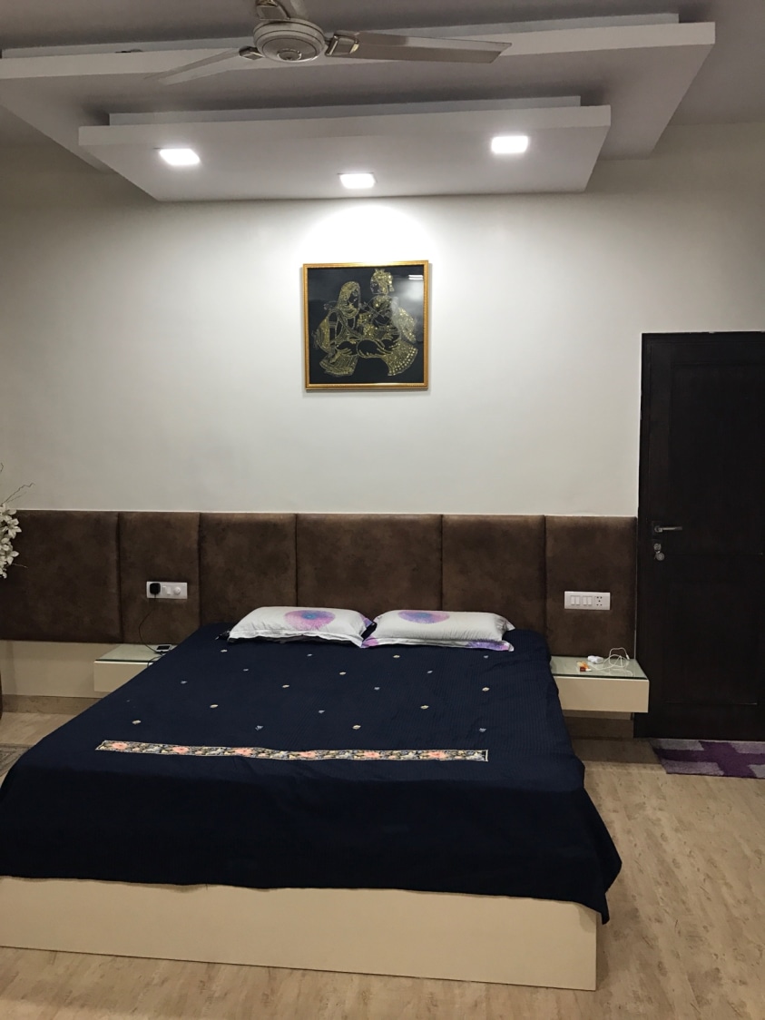 Guest Bedroom with Queen Size Bed and Cushioned Headboard by Ar. Barkha Jain Bedroom Modern | Interior Design Photos & Ideas