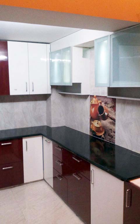 Modular Maroon-themed Kitchen! by Dezire modular kitchen & Interiors Modular-kitchen | Interior Design Photos & Ideas
