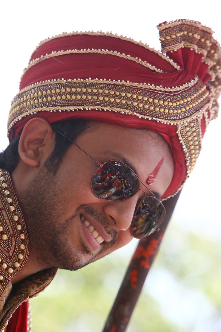 Groom's Ruby Red Turban With Golden Work by Wedding Toasters Wedding-photography Groom-wear-and-accessories | Weddings Photos & Ideas
