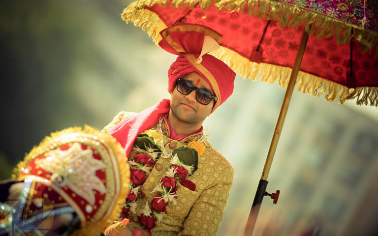 Handsome Groom Shadowed Under The Royal Umbrella by Viral Shah Wedding-photography | Weddings Photos & Ideas