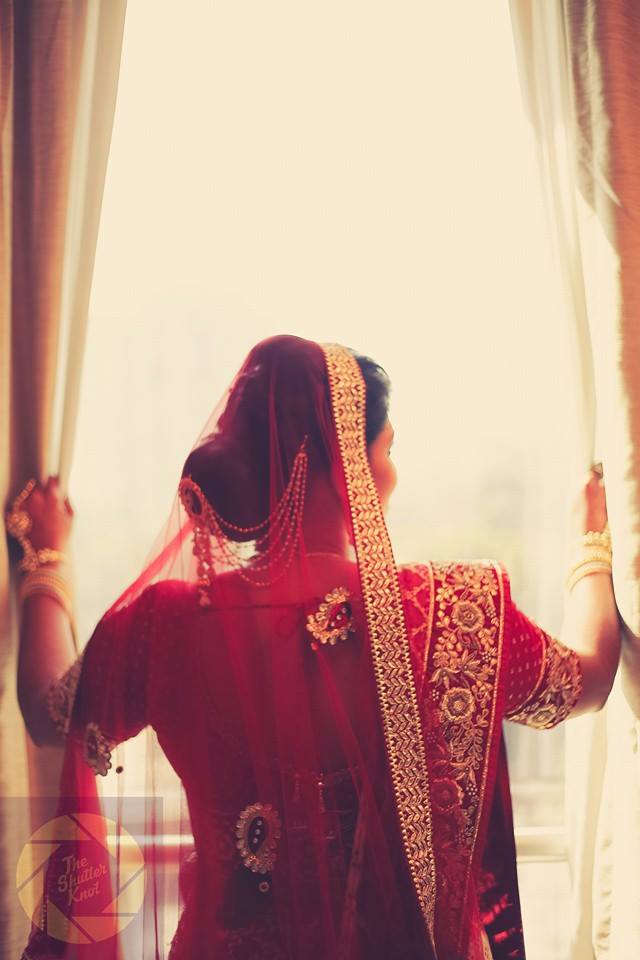 Simple Top Knot Bun Under The Veil by Viral Shah Wedding-photography Wedding-hairstyles | Weddings Photos & Ideas