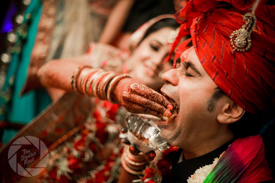 Groom Savouring An Exquisite Sweet by Viral Shah Wedding-photography | Weddings Photos & Ideas