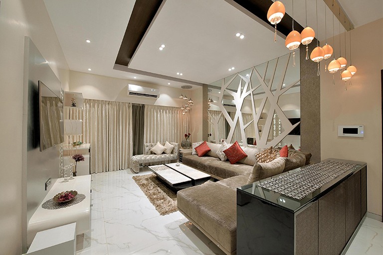 A Spacious White Living Room With Sectional Sofa by Megha Jain Living-room Contemporary | Interior Design Photos & Ideas