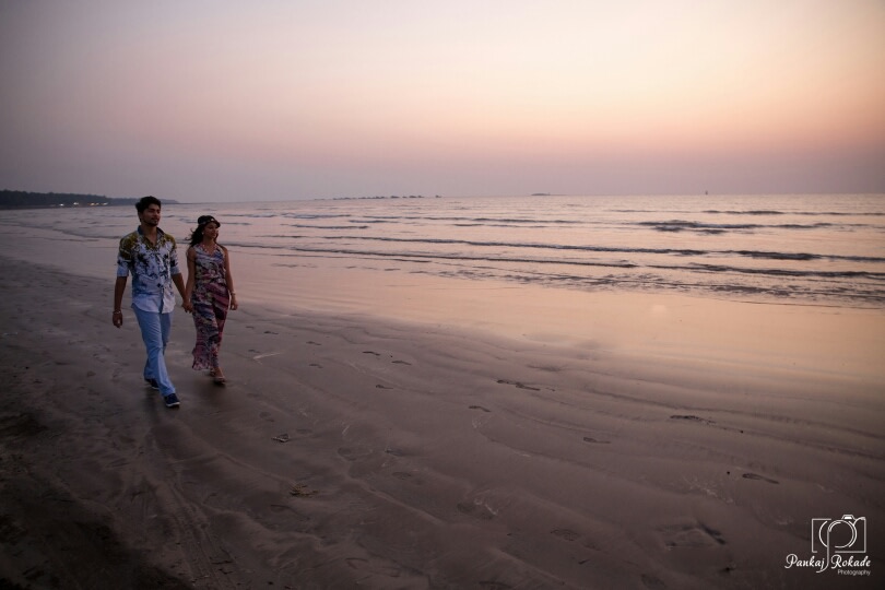 The couple taking a romantic walk at the beach by Pankaj Rokade Photography Wedding-photography | Weddings Photos & Ideas